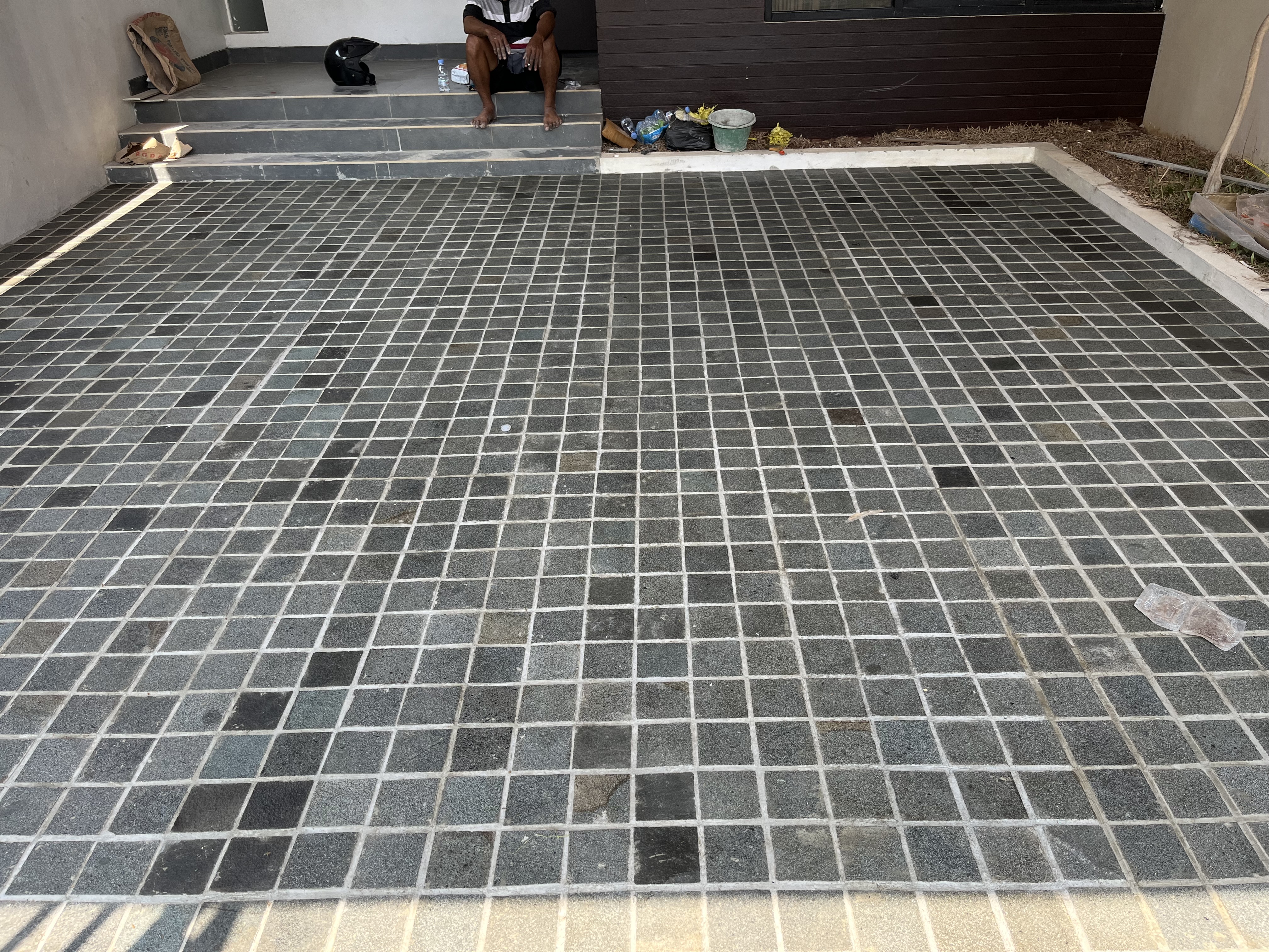 pemasangan batu andesit bekasi rumah minimalis